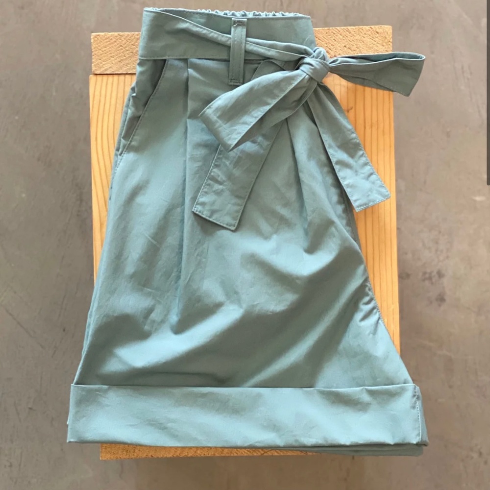 The Wide Cuffed Shorts in Cyan -- by Naked & Famous